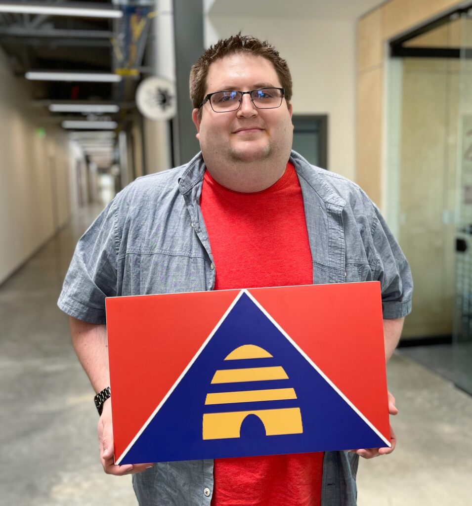 Photo of student Conner Pearson with his state flag submission