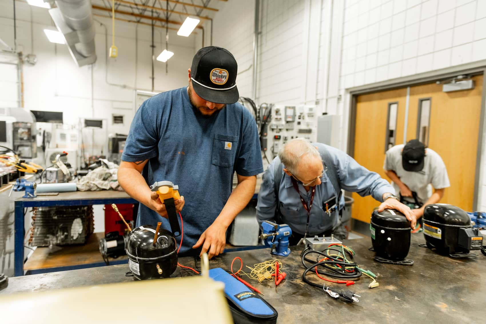 Student using a digital multimeter